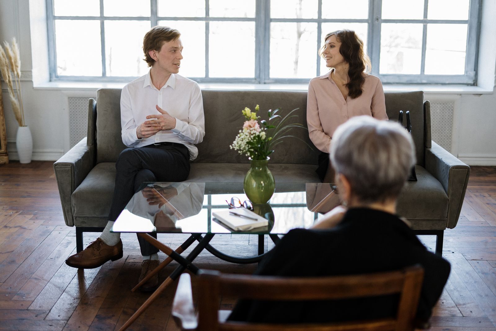 Senior leader in a considered conversation with a trusted advisor