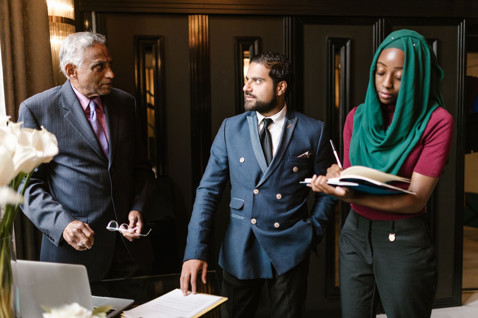A senior leader in a one-to-one coaching conversation as part of a leadership training program
