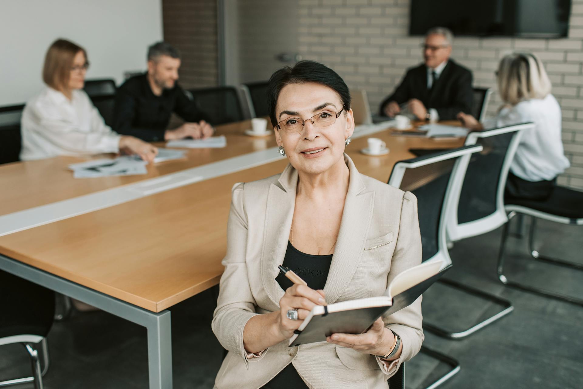 Senior executive reviewing strategy at desk